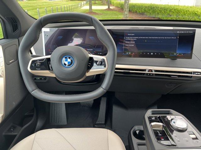 new 2025 BMW iX car, priced at $99,065