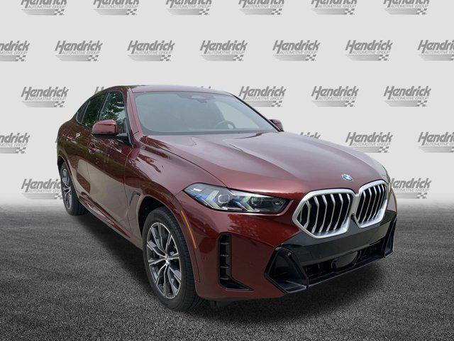 used 2025 BMW X6 car, priced at $73,977