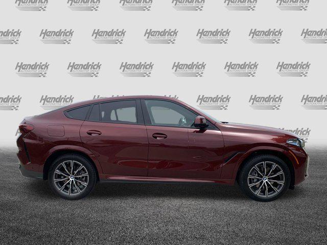 used 2025 BMW X6 car, priced at $73,977