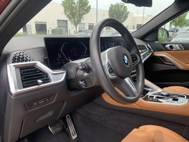 used 2025 BMW X6 car, priced at $73,977