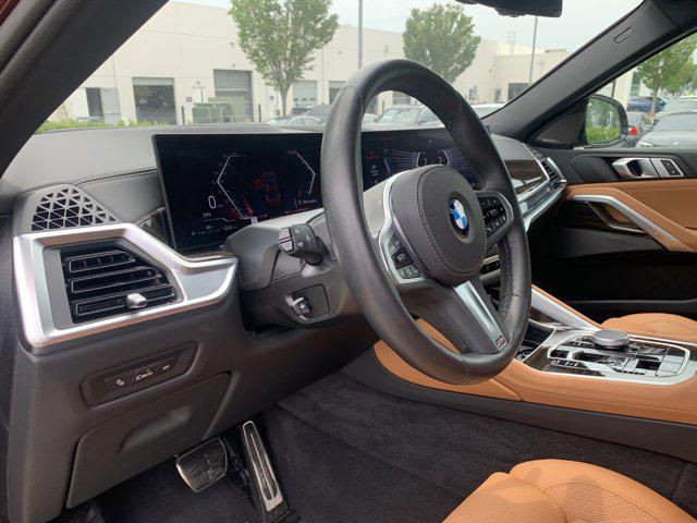 used 2025 BMW X6 car, priced at $73,977