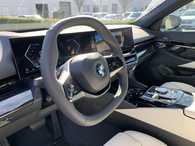 new 2025 BMW 530 car, priced at $63,975