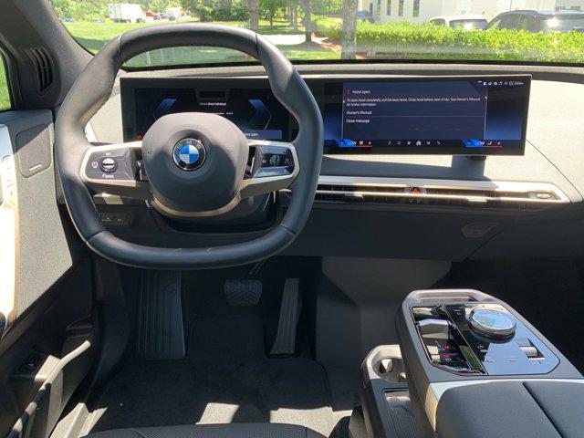 new 2026 BMW iX car, priced at $84,925