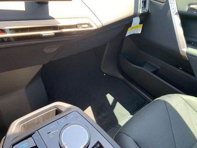 new 2026 BMW iX car, priced at $84,925