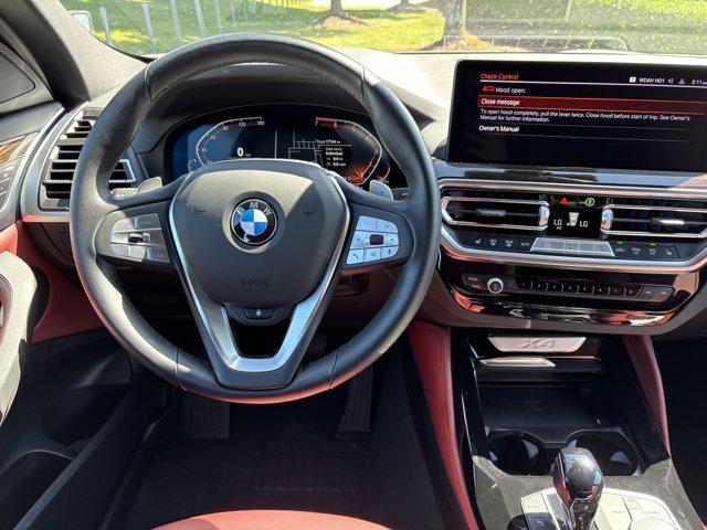 used 2025 BMW X4 car, priced at $49,477
