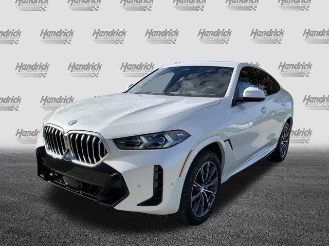 used 2025 BMW X6 car, priced at $70,977