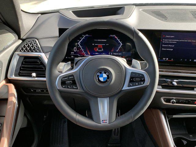 used 2025 BMW X6 car, priced at $70,977