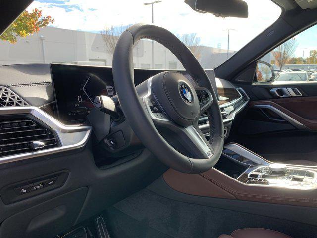 used 2025 BMW X6 car, priced at $70,977