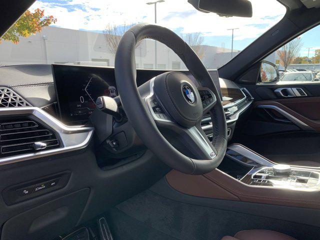 used 2025 BMW X6 car, priced at $70,977