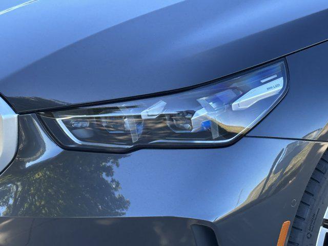 used 2024 BMW i5 car, priced at $45,977