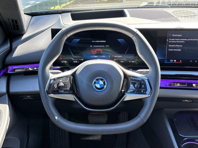 used 2024 BMW i5 car, priced at $45,977