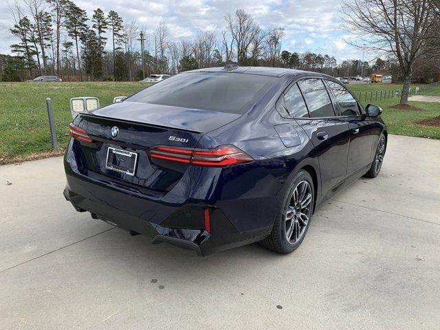 new 2025 BMW 530 car, priced at $70,825