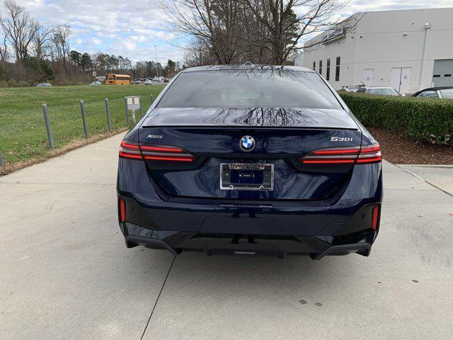 new 2025 BMW 530 car, priced at $70,825