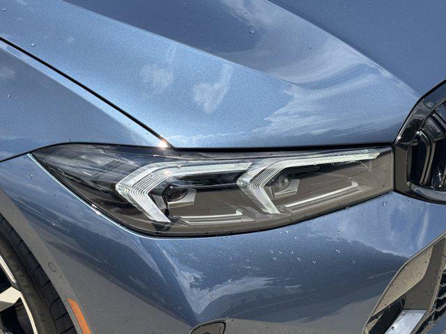 new 2025 BMW 330 car, priced at $55,855