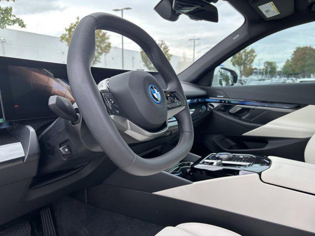 used 2025 BMW i5 car, priced at $53,977