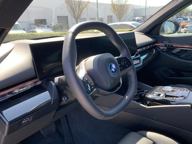 used 2024 BMW i5 car, priced at $55,977