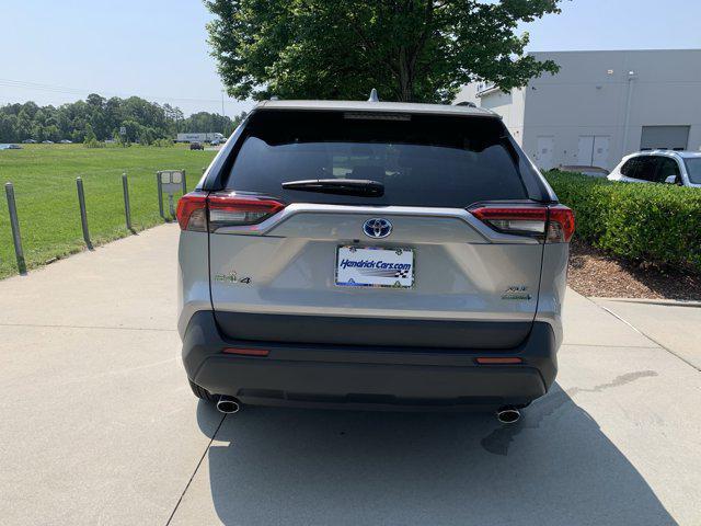 used 2021 Toyota RAV4 Hybrid car, priced at $29,977
