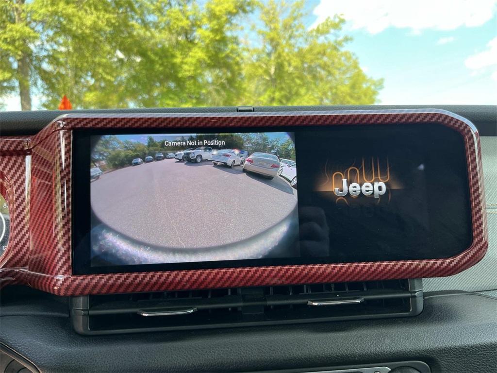 used 2024 Jeep Wrangler car, priced at $33,499