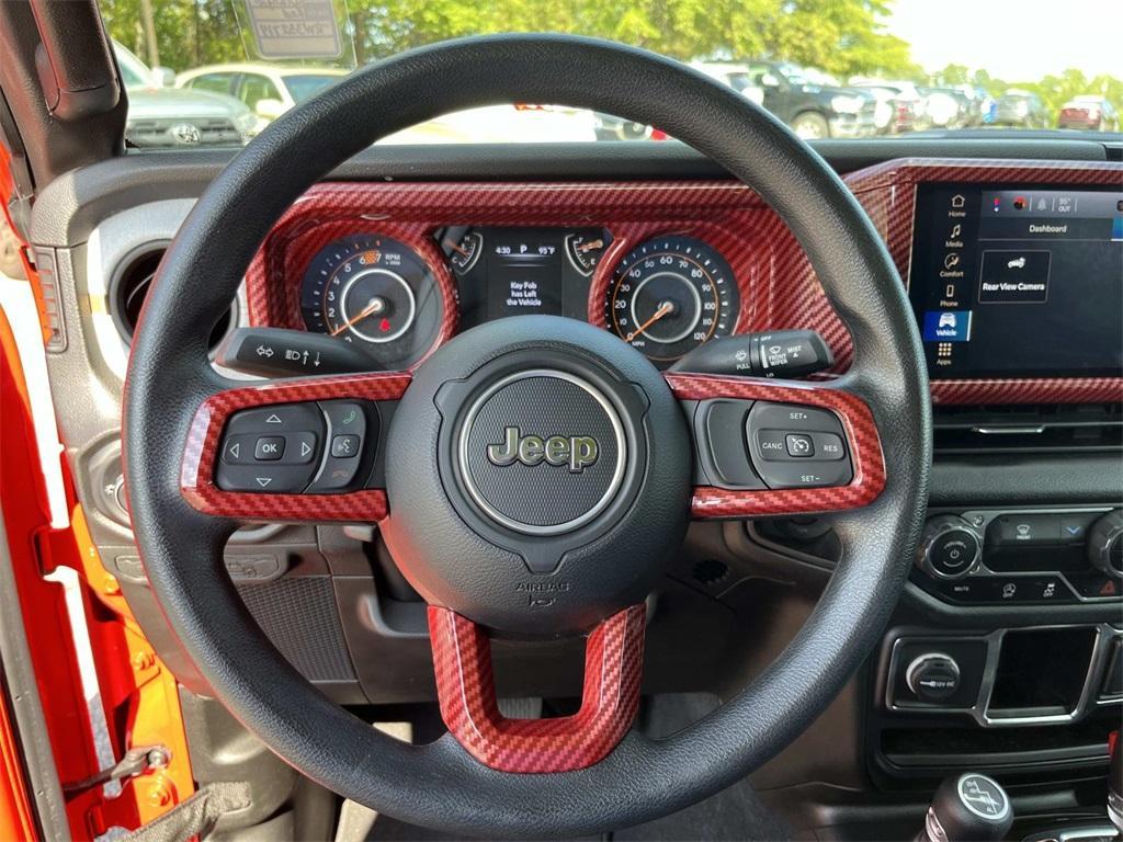 used 2024 Jeep Wrangler car, priced at $33,499