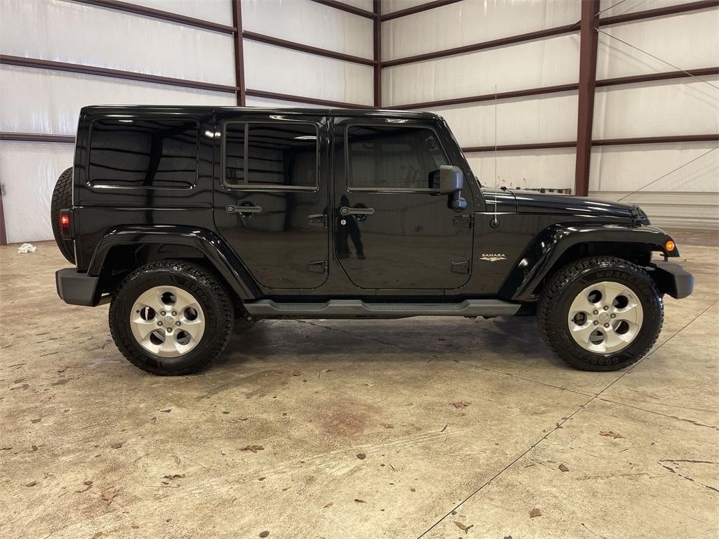 used 2014 Jeep Wrangler Unlimited car, priced at $16,997