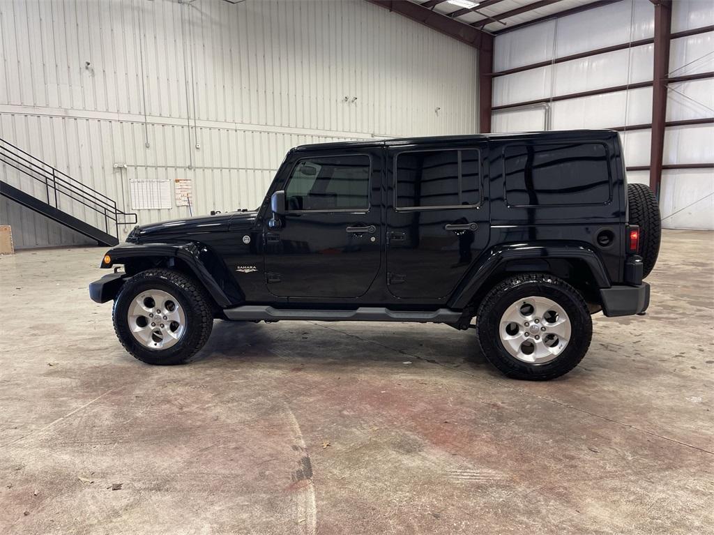 used 2014 Jeep Wrangler Unlimited car, priced at $16,997