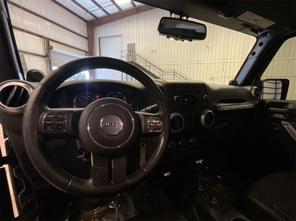 used 2014 Jeep Wrangler Unlimited car, priced at $16,997