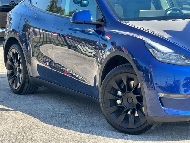 used 2022 Tesla Model Y car, priced at $32,995