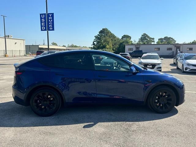 used 2022 Tesla Model Y car, priced at $32,995