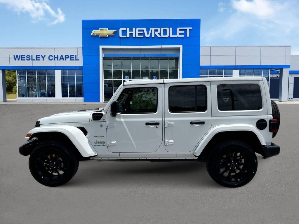 used 2024 Jeep Wrangler 4xe car, priced at $33,597