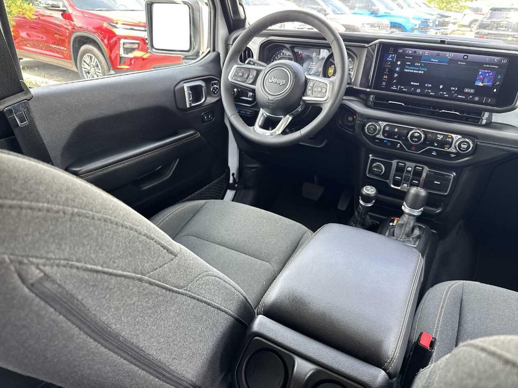used 2024 Jeep Wrangler 4xe car, priced at $33,597