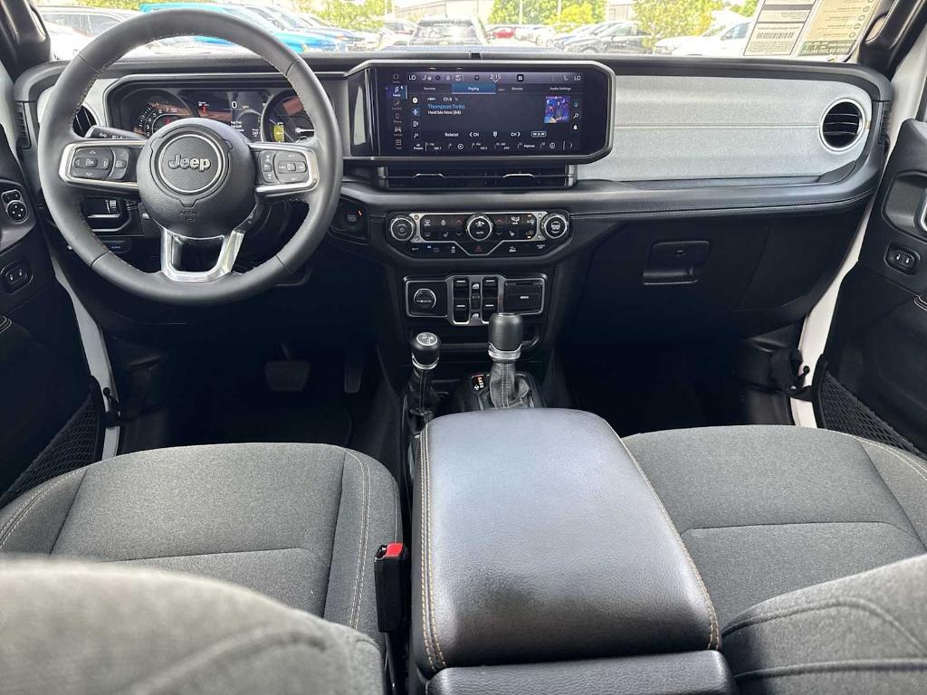used 2024 Jeep Wrangler 4xe car, priced at $33,597