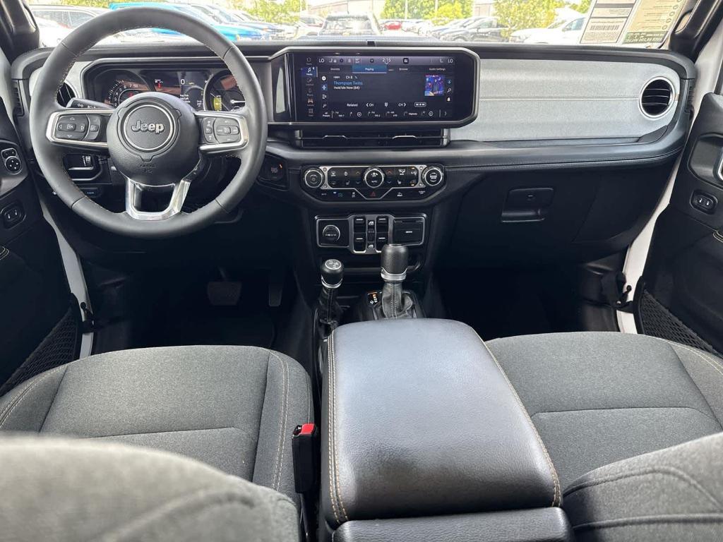 used 2024 Jeep Wrangler 4xe car, priced at $33,597