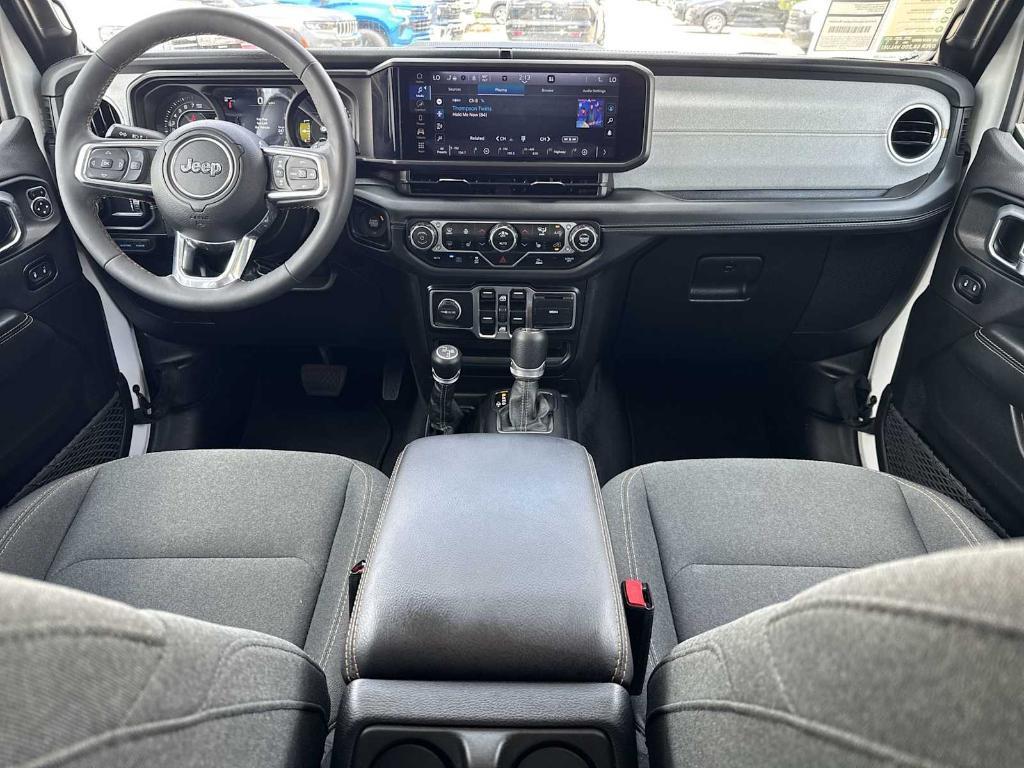 used 2024 Jeep Wrangler 4xe car, priced at $33,597