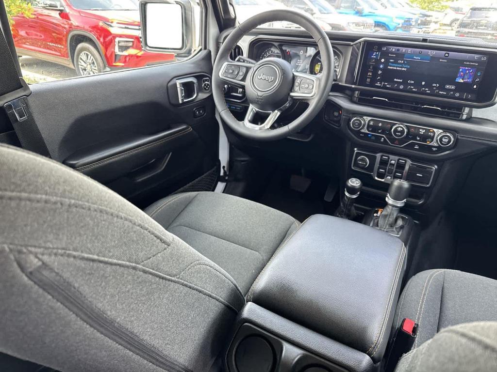 used 2024 Jeep Wrangler 4xe car, priced at $33,597