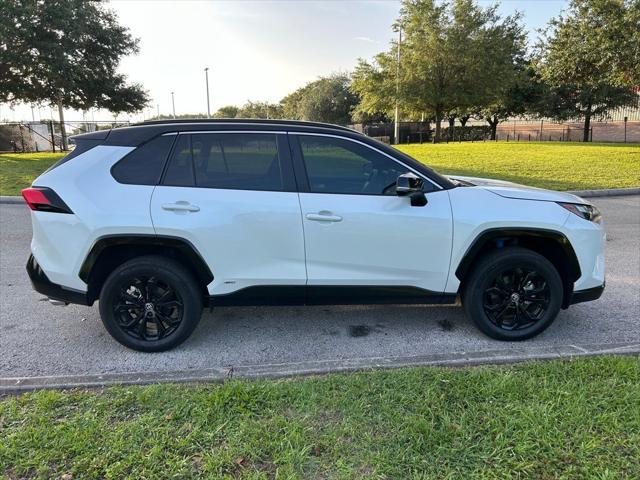 used 2023 Toyota RAV4 Hybrid car, priced at $38,977