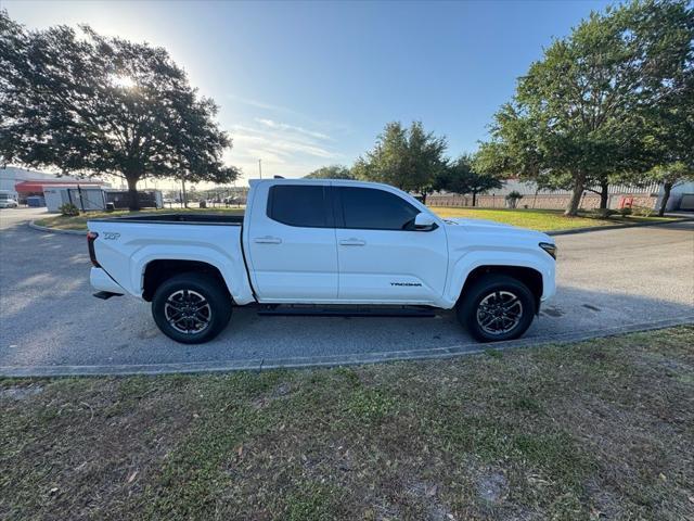 used 2025 Toyota Tacoma car, priced at $45,977