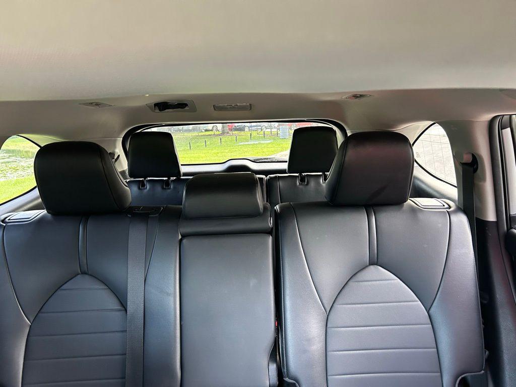 used 2021 Toyota Highlander Hybrid car, priced at $29,737