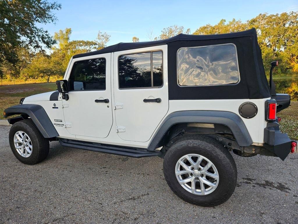 used 2017 Jeep Wrangler Unlimited car, priced at $20,477