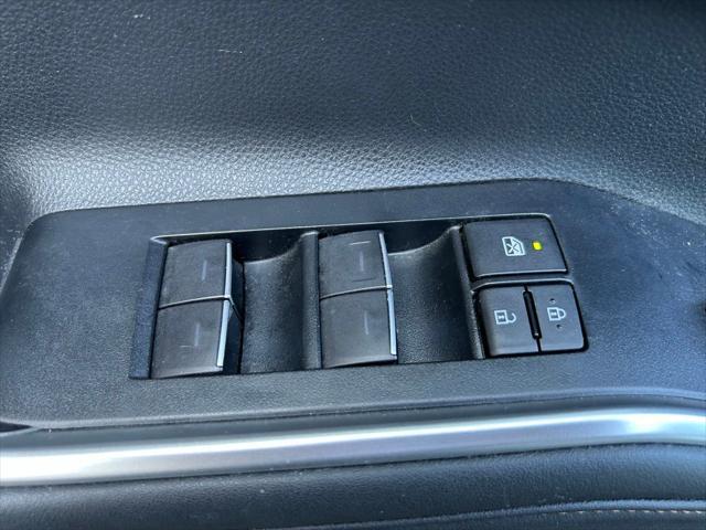 used 2023 Toyota Highlander Hybrid car, priced at $40,977