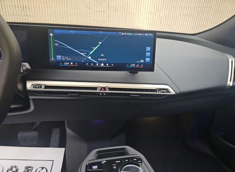 used 2024 BMW iX car, priced at $57,500
