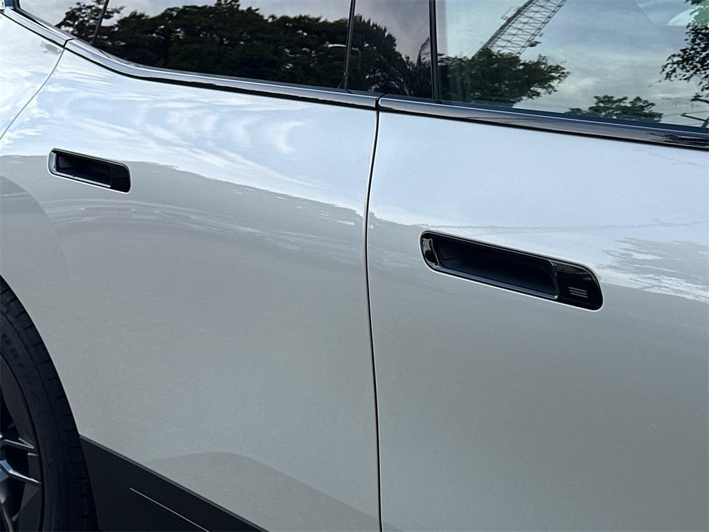 used 2024 BMW iX car, priced at $53,000