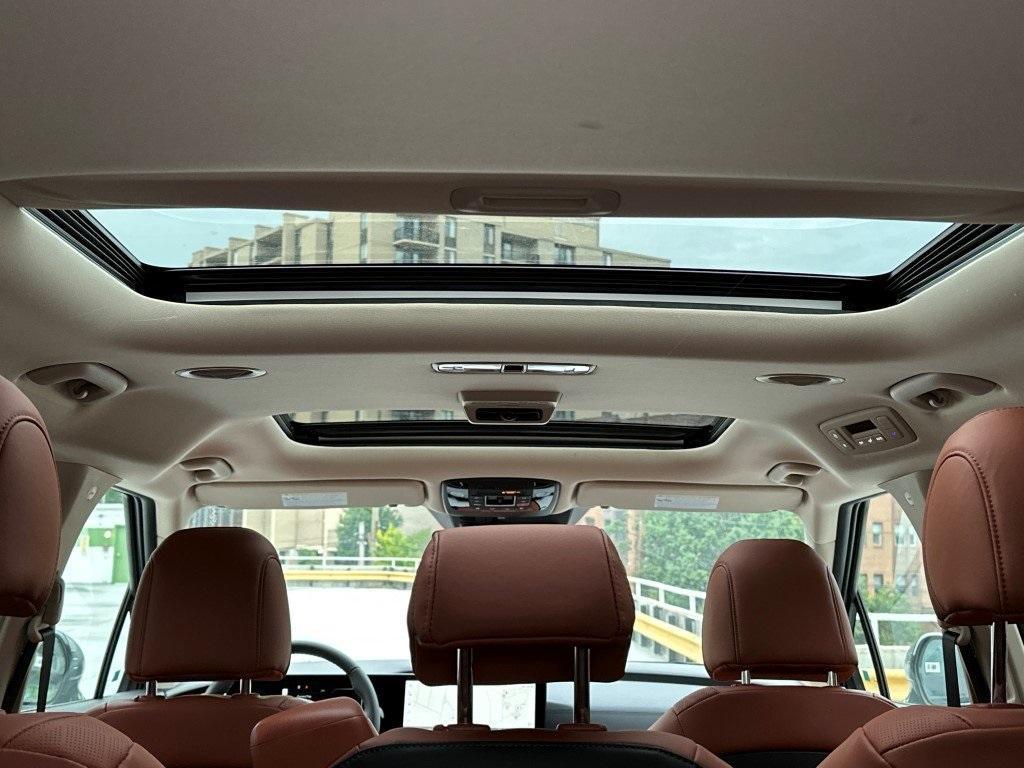 new 2025 Kia Carnival Hybrid car, priced at $49,496