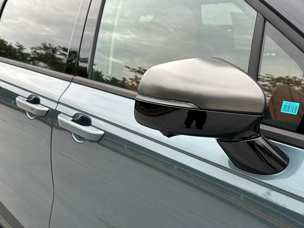 new 2025 Kia Carnival Hybrid car, priced at $49,496
