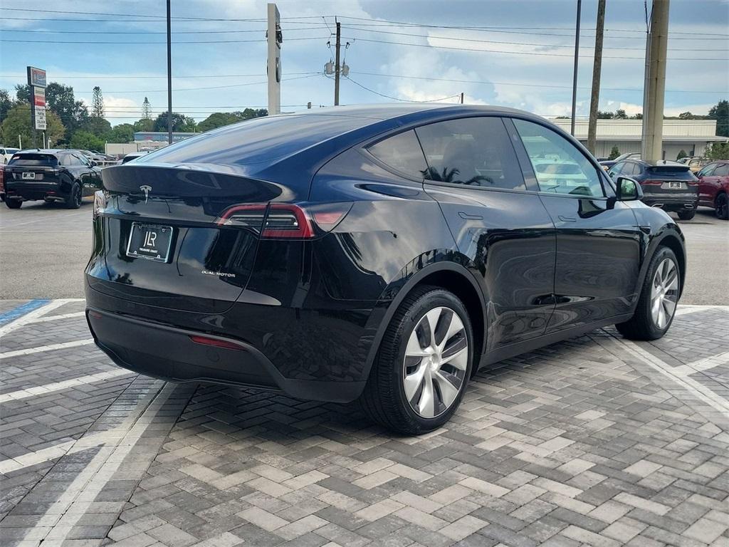 used 2024 Tesla Model Y car, priced at $34,997