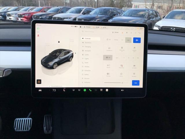 used 2024 Tesla Model Y car, priced at $35,692