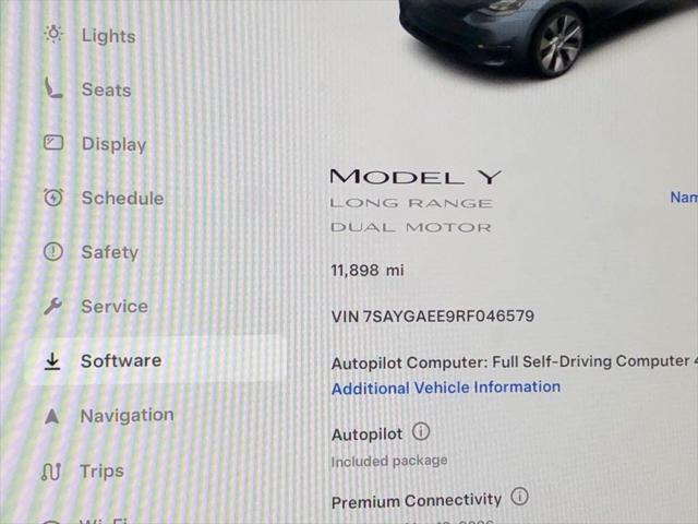 used 2024 Tesla Model Y car, priced at $35,692