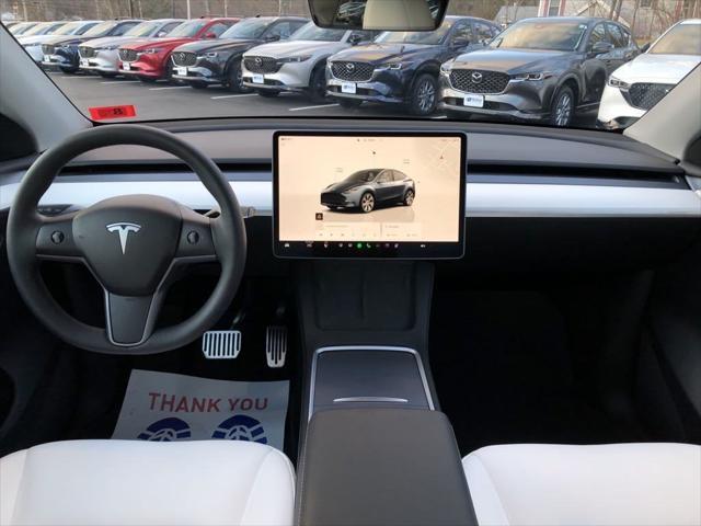 used 2024 Tesla Model Y car, priced at $35,692