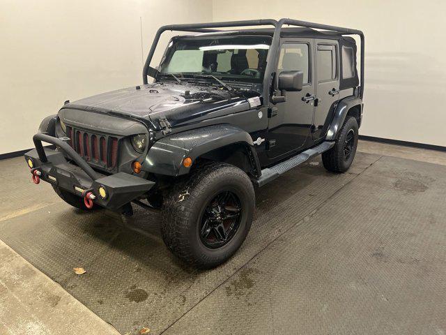 used 2013 Jeep Wrangler Unlimited car, priced at $16,997