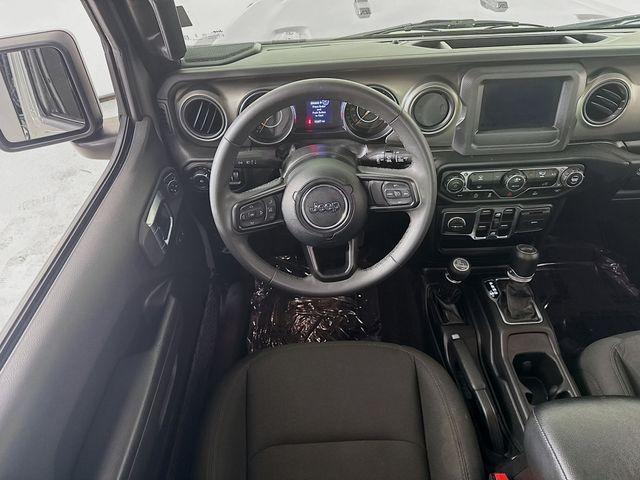 used 2023 Jeep Wrangler car, priced at $28,300