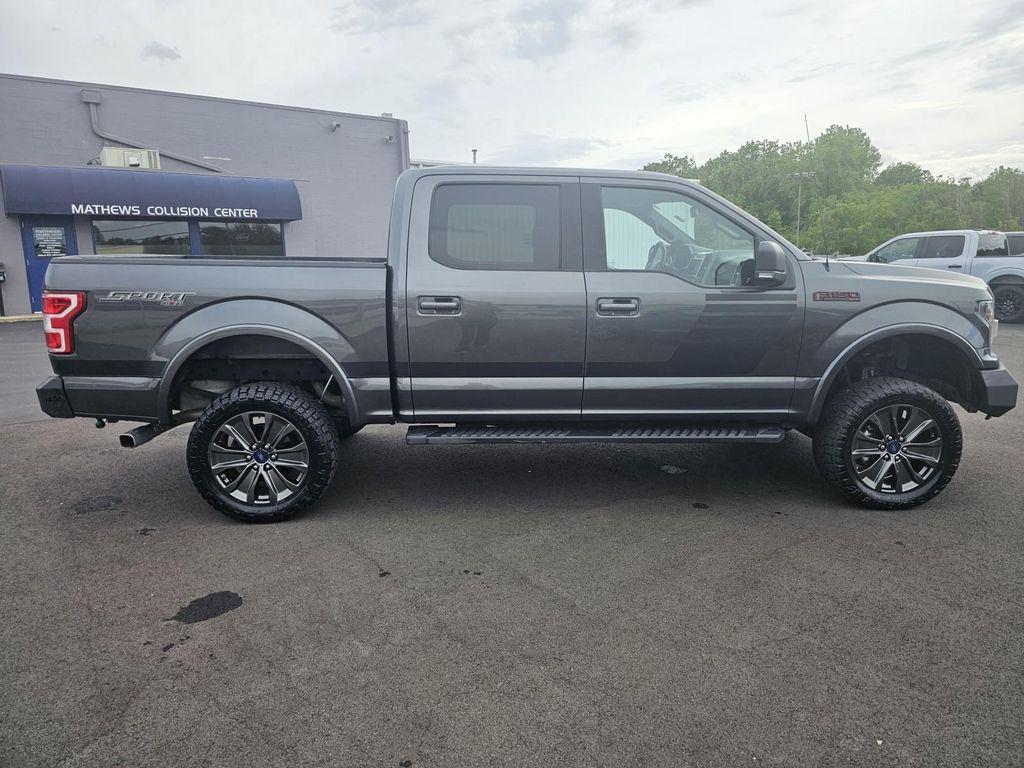used 2018 Ford F-150 car, priced at $23,465